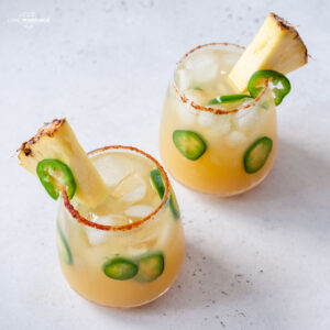 Pineapple Jalapeno Margaritas are the best blend of sweet and spicy. If you love margaritas and are looking for a new, fun way to make them, this is it.