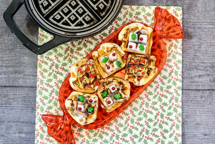 Cinnamon Roll Waffles with a holiday flare is your new favorite Christmas breakfast.