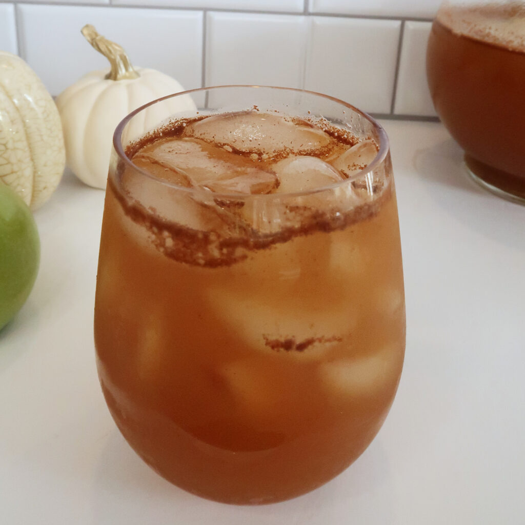 This 4-ingredient Caramel Apple Punch is the perfect fall cocktail recipe and a great afternoon drink for Thanksgiving. 